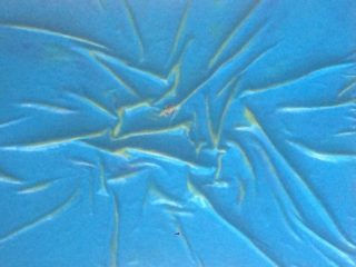 An Oil painting by Naji Sassine in the Abstract style  with main colour being Blue and titled Earth Suffering in Blue