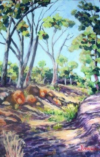 An Acrylic painting by Yvonne West depicting Landscape Outback Rocks and Trees with main colour being Blue Green and Purple and titled Creek Bed Flinders Ranges