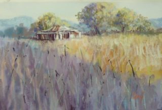 A Pastel painting by Penelope Gilbert-Ng in the Impressionist style  depicting Landscape Rural and Sheds with main colour being Blue Brown and Cream and titled Afternoon Shadows