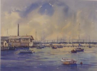 A Watercolour artwork by Annee Kelly in the Impressionist style  depicting Landscape Boats and Water with main colour being Blue Grey and Pink and titled Golden Glow, Williamstown