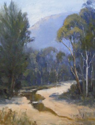An Oil painting by Trish Bennett in the Realist Impressionist style  depicting Landscape Mountains and Trees with main colour being Blue Brown and Green and titled River Reflections