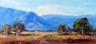 An Oil painting by Trish Bennett in the Impressionist style  depicting Landscape Mountains and Trees with main colour being Blue Brown and Ochre and titled Happy Days Capertee